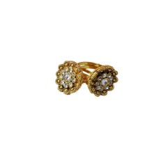 Gold plated ring with white stone flower design